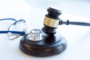 Gavel and stethoscope and Personal Injury Affect Medicare 